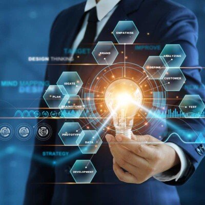 Excited serious professional using VR glasses for project developing. Man wearing virtual reality headset, touching air, gesturing. Interactive technology concept